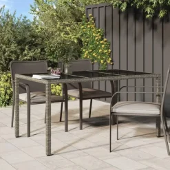Tuintafels-vidaXL - Tuintafel - Grijs - Gehard glas en poly rattan - 150 x 90 x 75 cm